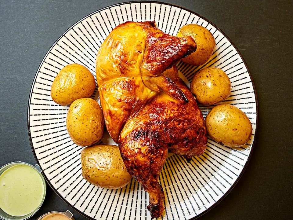 Medio pollo a la brasa